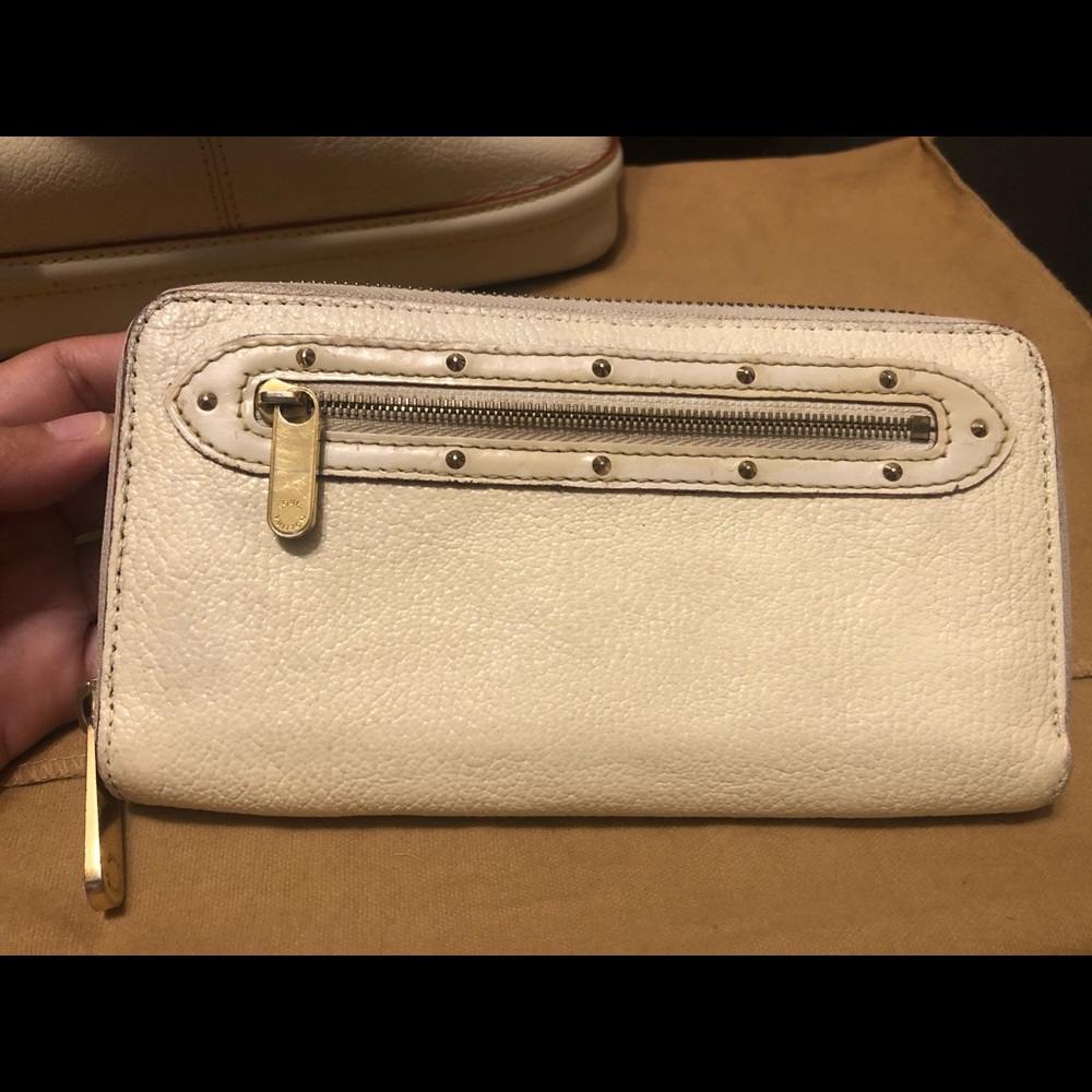 Authentic Louis Vuitton Suhali Leather wallet